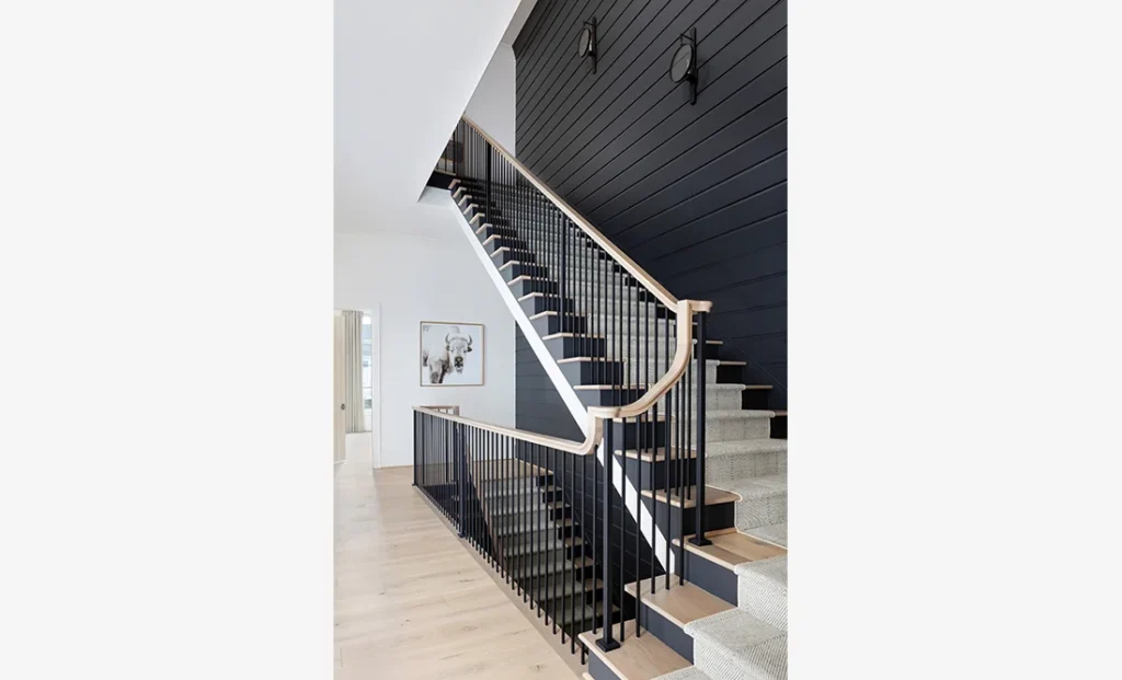 The Riverwood features a custom interior design staircase from Cristi Holcombe Interiors in Alpharetta, GA