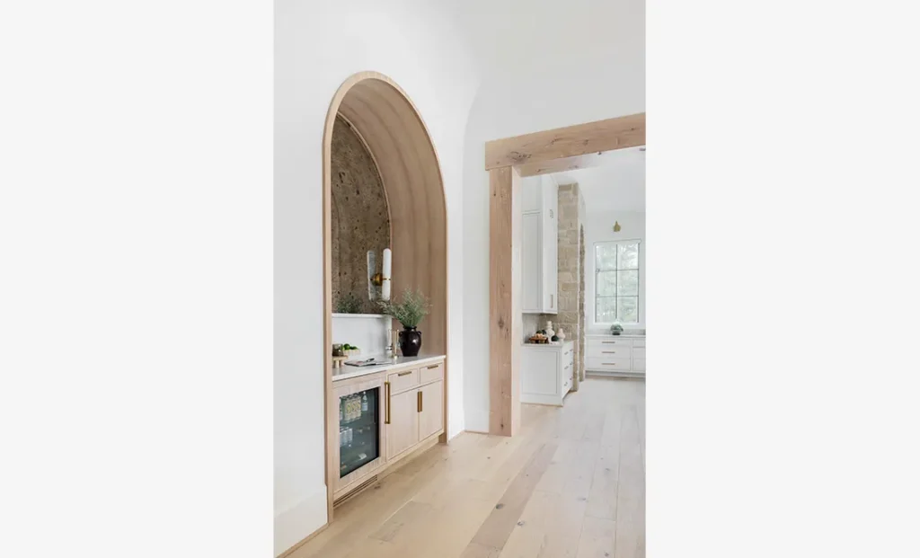 The Riverwood features a custom interior design wet bar from Cristi Holcombe Interiors in Alpharetta, GA