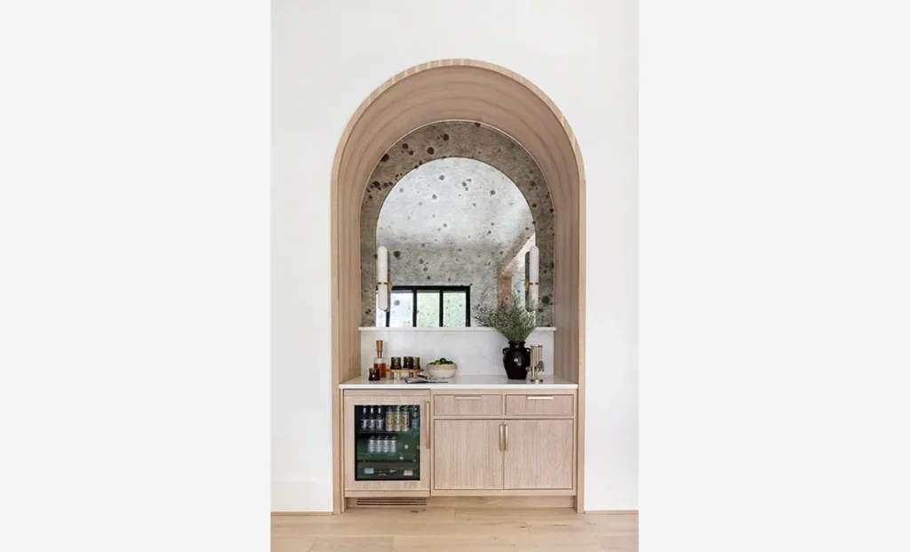 The Riverwood features a custom interior design wet bar from Cristi Holcombe Interiors in Alpharetta, GA